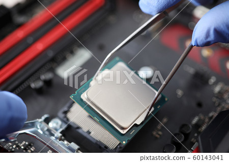 Man working with computer equipment 60143041