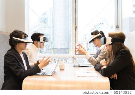 People who work with VR goggles 60143852