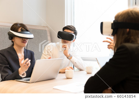 People who work with VR goggles 60143854