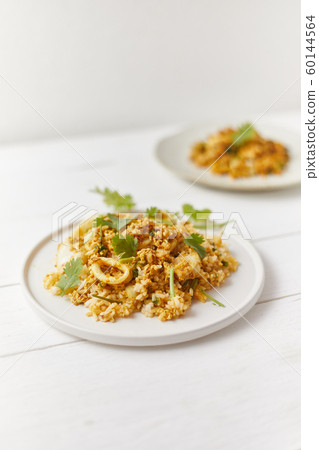 Stir fried squid with curry powder, Thai food . Stir fried squid with curry powder, Thai food . 60144564