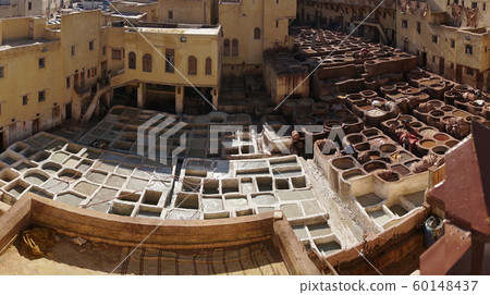 Panorama of Chouara tannery in old medina in Fes, a traditional and old tannery with workers working making methods of leather in the city Fes, Morocco 60148437