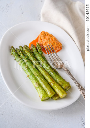 Fried asparagus with romesco sauce 60148615