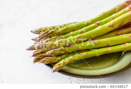 Fresh asparagus on the plate Fresh asparagus on the plate 60148617