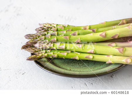 Fresh asparagus on the plate 60148618