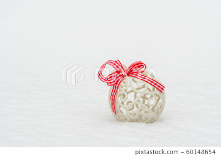 Christmas bauble  on the white fresh snow 60148654