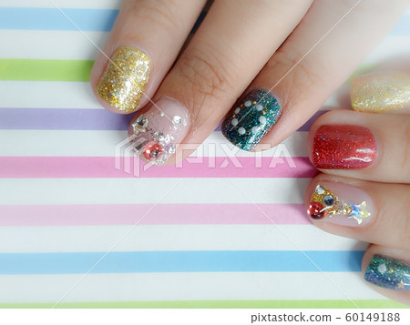 Female manicure. Steep and very stylish design of manicure. Colorful nails. Female manicure. Steep and very stylish design of manicure. Colorful nails. 60149188