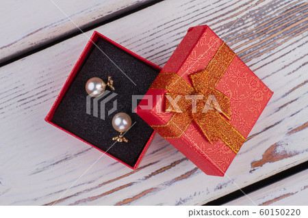 Pearl earrings in red gift box. 60150220