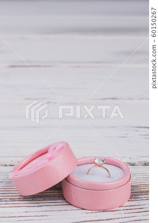 Jewelry box with golden ring. Jewelry box with golden ring. 60150267