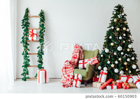 decor of the house with Christmas tree with gifts of the new year holiday winter decor of the house with Christmas tree with gifts of the new year holiday winter 60150903