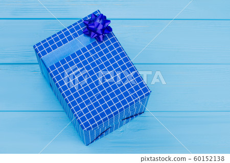 Checkered blue box with bow. Checkered blue box with bow. 60152138
