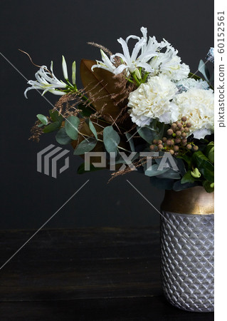 White toned bouquet in vintage style in a ceramic White toned bouquet in vintage style in a ceramic 60152561