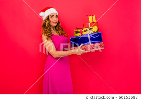 A beautiful sexy girl in a New Year's hat, hold in 60153688