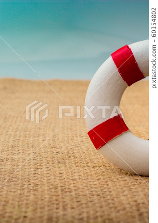 Man figurine led by an arrow to Life preserver Man figurine led by an arrow to Life preserver 60154802