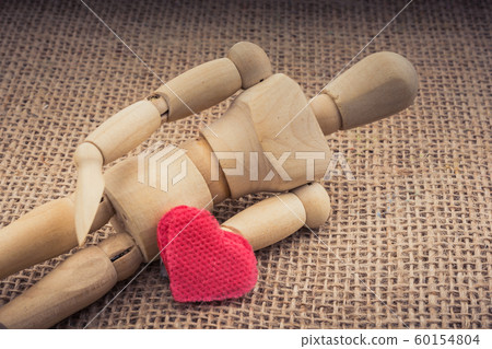 Heart shaped object in the hand Heart shaped object in the hand 60154804