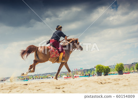 Turkish horseman ethnic clothes examples Turkish horseman ethnic clothes examples 60154809