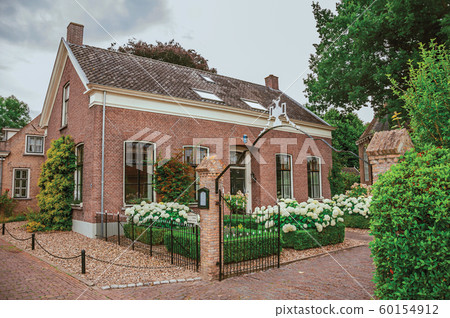 Charming and quiet street with brick rustic house at Drimmelen Charming and quiet street with brick rustic house at Drimmelen 60154912