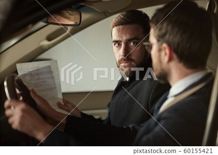 Young man buying the car Young man buying the car 60155421