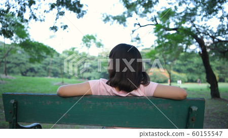 Holiday concept. The girl sitting back Look at the 60155547