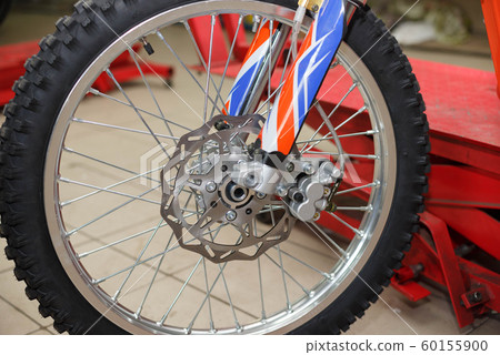 Motorcycle wheel repair after tire leaks or disc damage. 60155900