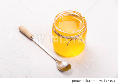 Homemade liquid ghee or clarified butter in 60157403