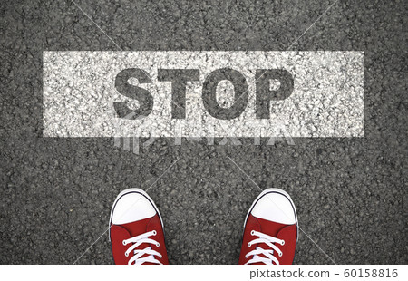 Red shoes in front of access denied sign Red shoes in front of access denied sign 60158816