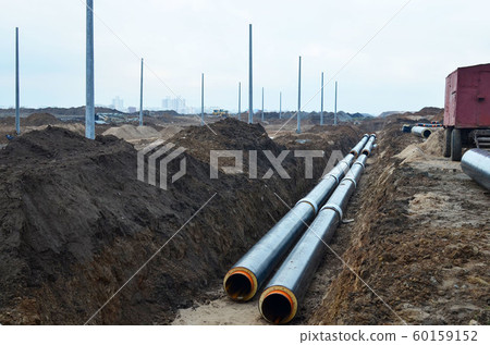 Laying underground storm sewers at a construction site 60159152