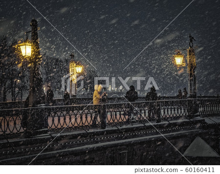 Falling snow in the night city. Saint-Petersburg. Falling snow in the night city. Saint-Petersburg. 60160411