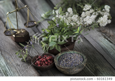 Herbs medicine and vintage wooden background Herbs medicine and vintage wooden background 60161349
