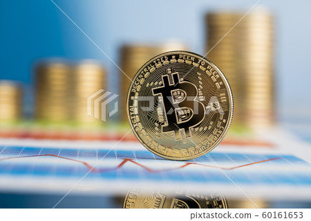 Gold Bitcoin on the background of the chart Gold Bitcoin on the background of the chart 60161653