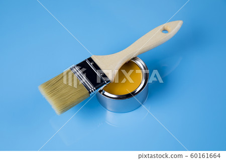 Tin cans with paint and brushes 60161664