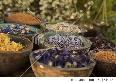 Natural remedy,Herbal medicine and wooden table 60161942