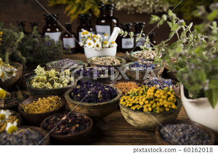 Natural remedy,Herbal medicine and wooden table 60162018