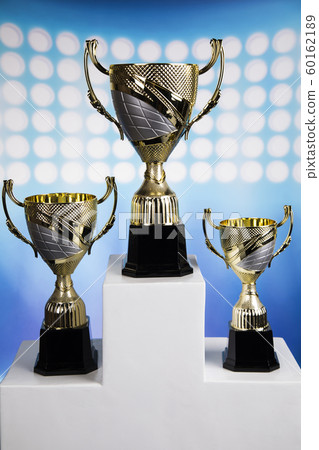 Podium, Winner trophy, Sport equipment and balls 60162189