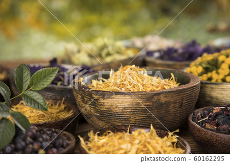 Natural remedy,Herbal medicine and wooden table 60162295