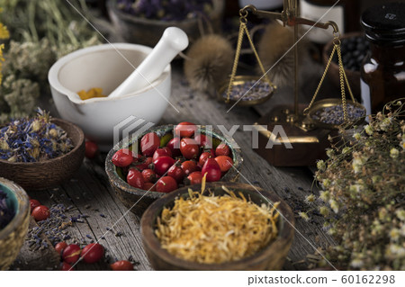 Natural remedy, healing herbs background Natural remedy, healing herbs background 60162298