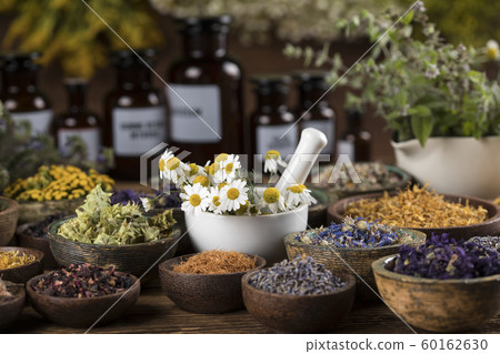 Herbs medicine and vintage wooden background 60162630