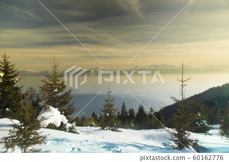 Sunset over the mountains, winter landscape Sunset over the mountains, winter landscape 60162776