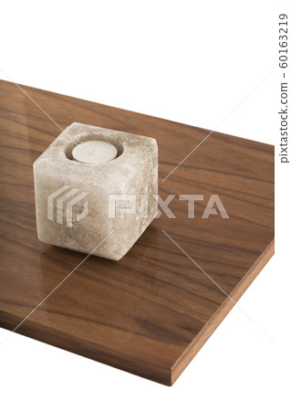 Candlestick made of natural salt on varnished 60163219