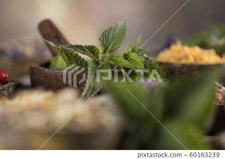 Herbs medicine and vintage wooden background 60163239