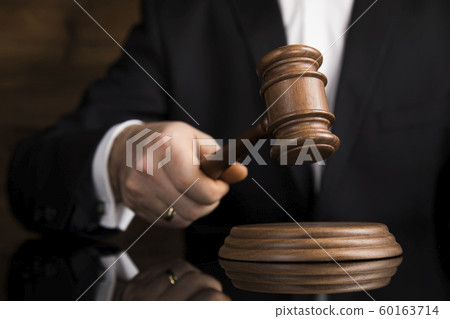 Justice and law concept, Male judge in a courtroom Justice and law concept, Male judge in a courtroom 60163714