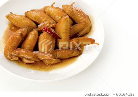 Sweet and spicy teriyaki chicken wings 60164182