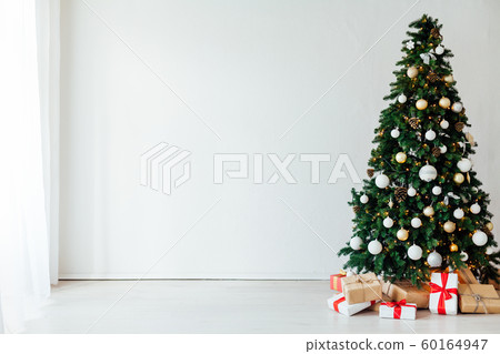 Christmas tree with gifts for the new year decor of the white room winter holiday Christmas tree with gifts for the new year decor of the white room winter holiday 60164947