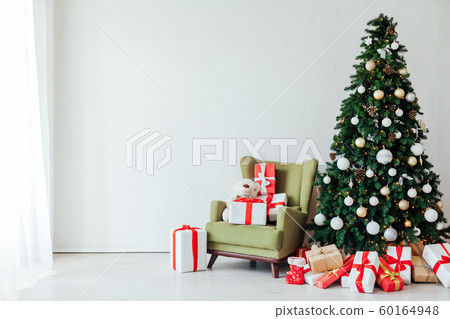 Christmas tree with gifts for the new year decor of the white room winter holiday Christmas tree with gifts for the new year decor of the white room winter holiday 60164948