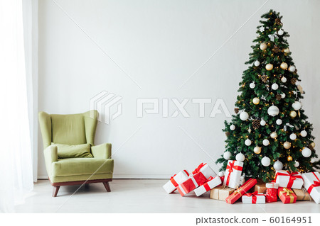 Christmas tree with gifts for the new year decor of the white room winter holiday Christmas tree with gifts for the new year decor of the white room winter holiday 60164951