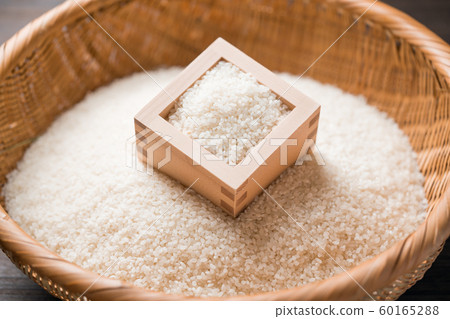 New rice in colander New rice in colander 60165288