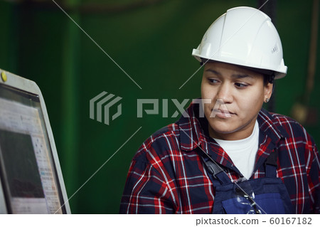 Portrait of Mixed-Race Female Worker at Plant Portrait of Mixed-Race Female Worker at Plant 60167182