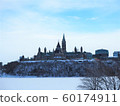 Canada's Parliament and the Ottawa River in a harsh winter 60174911
