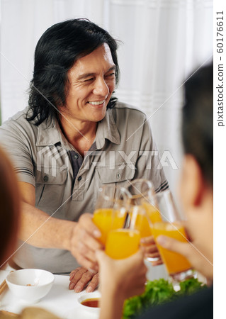 Mature man at dinner Mature man at dinner 60176611