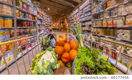 Supermarket cart with products 60177936