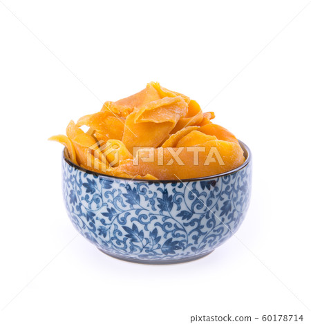 Dried Mango or Dried Mango slices on a background Dried Mango or Dried Mango slices on a background 60178714